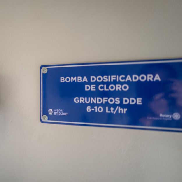 Simple, legible room sign placed above a doorway for clear wayfinding