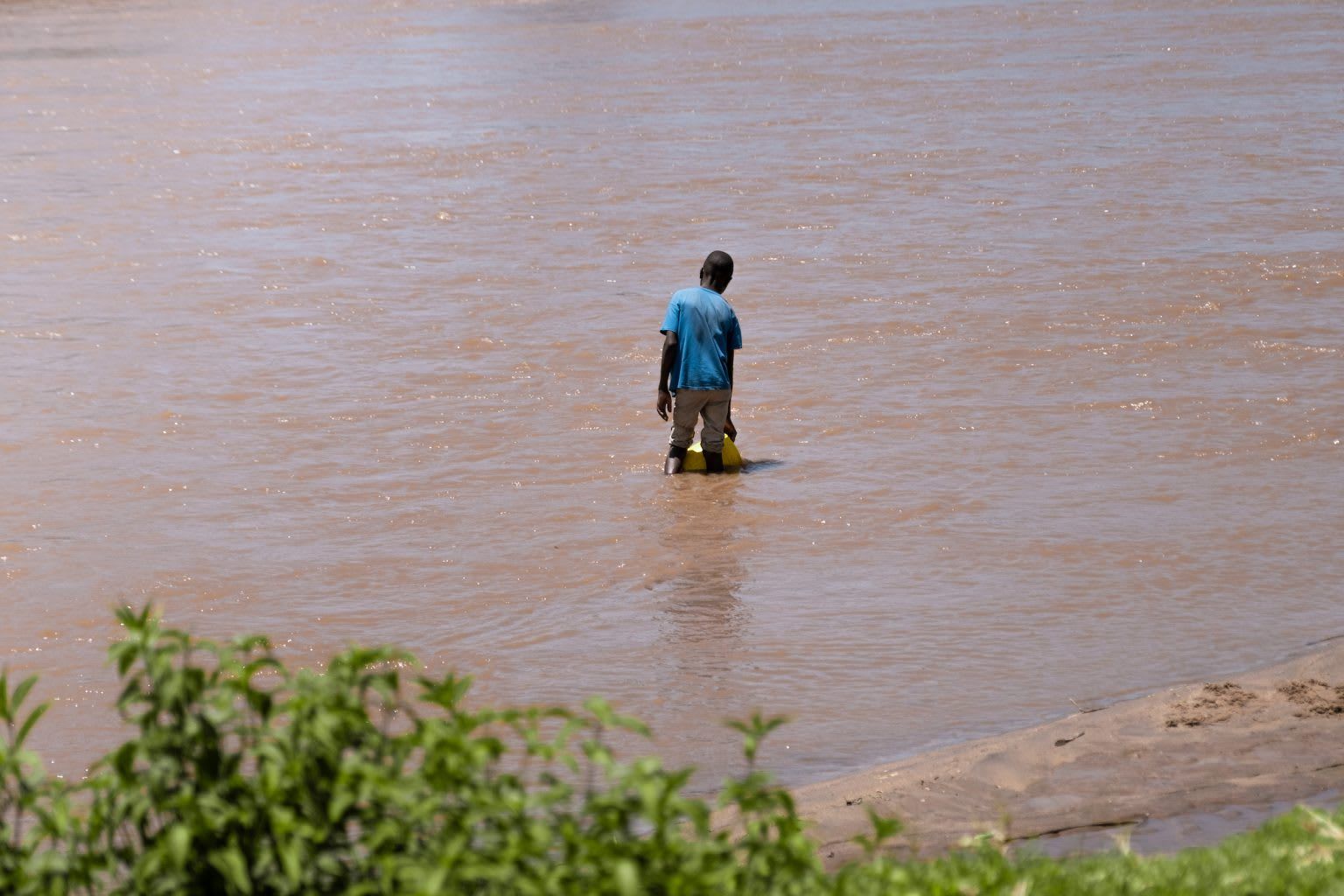 Collecting water from river