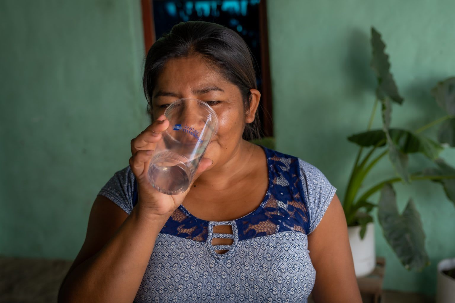 Woman drinking safe, clean water