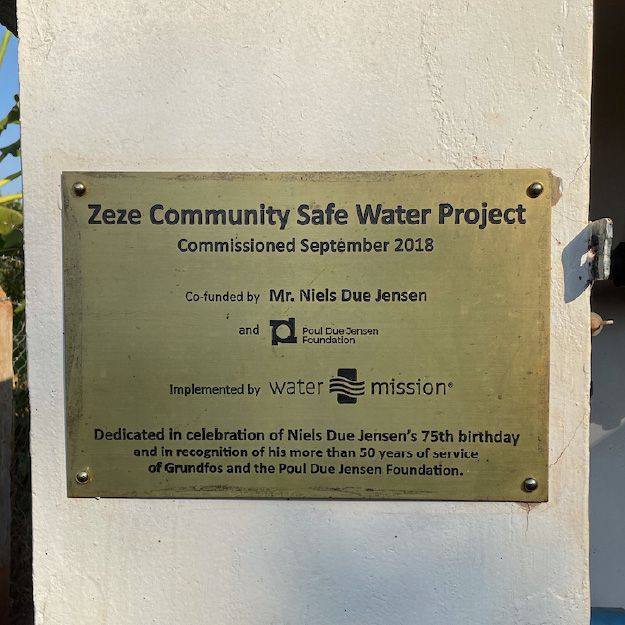 Standardized partner recognition plaque with aligned logos and consistent spacing