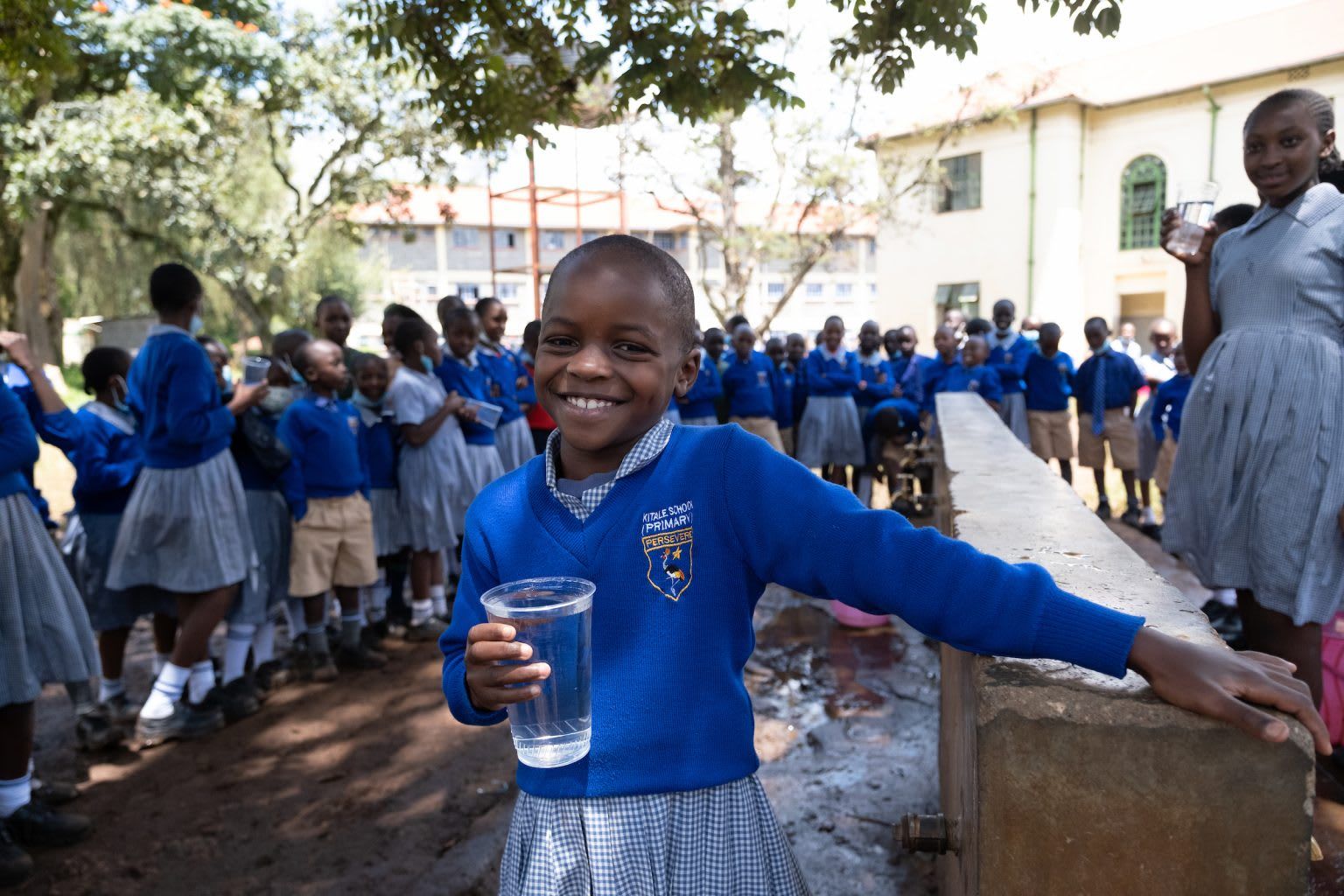 School children drinking safe, clean water
