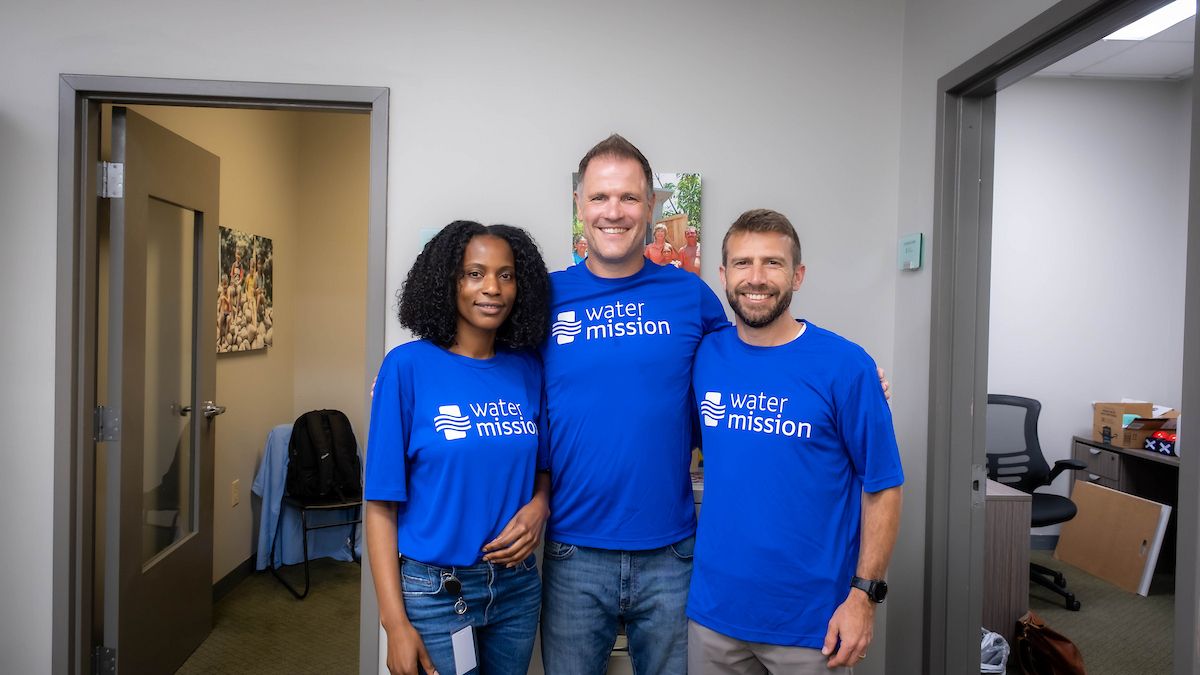 Wearing Water Mission t-shirts.