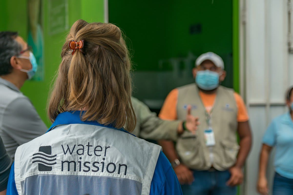 People in Water Mission tshirts
